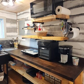 Fridge, microwave, stovetop, coffee/tea maker