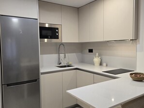 Fridge, microwave, coffee/tea maker, toaster