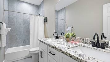 Hair dryer, towels, soap, toilet paper