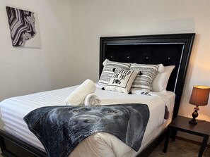 2 bedrooms, desk, iron/ironing board, travel crib