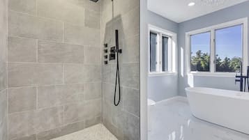 Jetted bath, hair dryer, towels, soap