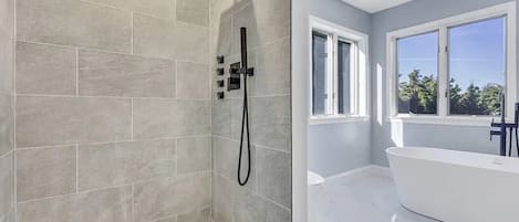 Jetted bath, hair dryer, towels, soap