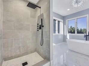Jetted bath, hair dryer, towels, soap