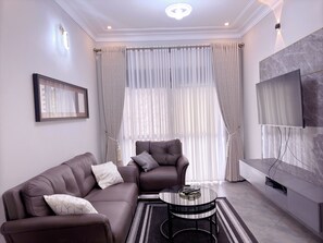 Deluxe Apartment | Living area