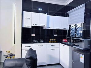 Standard Apartment | Private kitchen - Tanzi Homes (Mbarara)