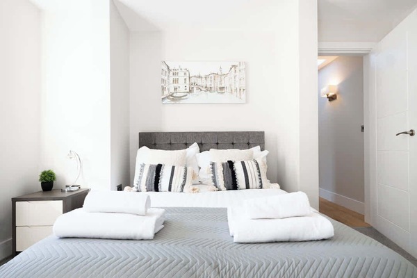 Unwind in the master bedroom, where elegance come together for the ultimate in comfort and relaxation.