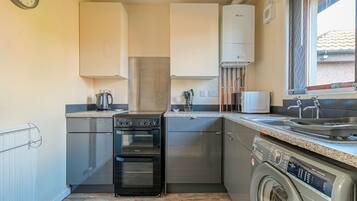 Fridge, microwave, oven, cookware/dishes/utensils