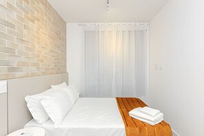 1 bedroom, desk, iron/ironing board, travel cot