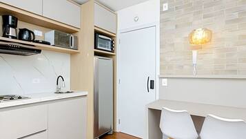 Fridge, microwave, stovetop, coffee/tea maker