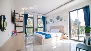 A modern bedroom with a bed, bedside table, and a large window. - Bin Bin Hotel 15 - Near Feliz En Vista (Ho Chi Minh City)
