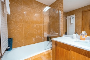 Shower, eco-friendly toiletries, hair dryer, bidet