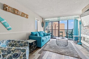 Smart TV, fireplace, books