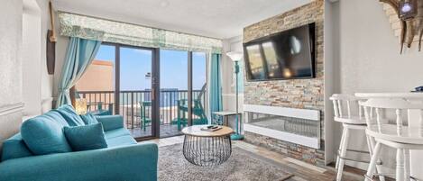 Smart TV, fireplace, books