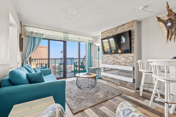 Smart TV, fireplace, books