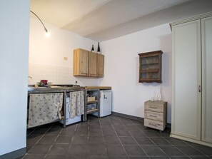 Fridge, microwave, cookware/dishes/utensils