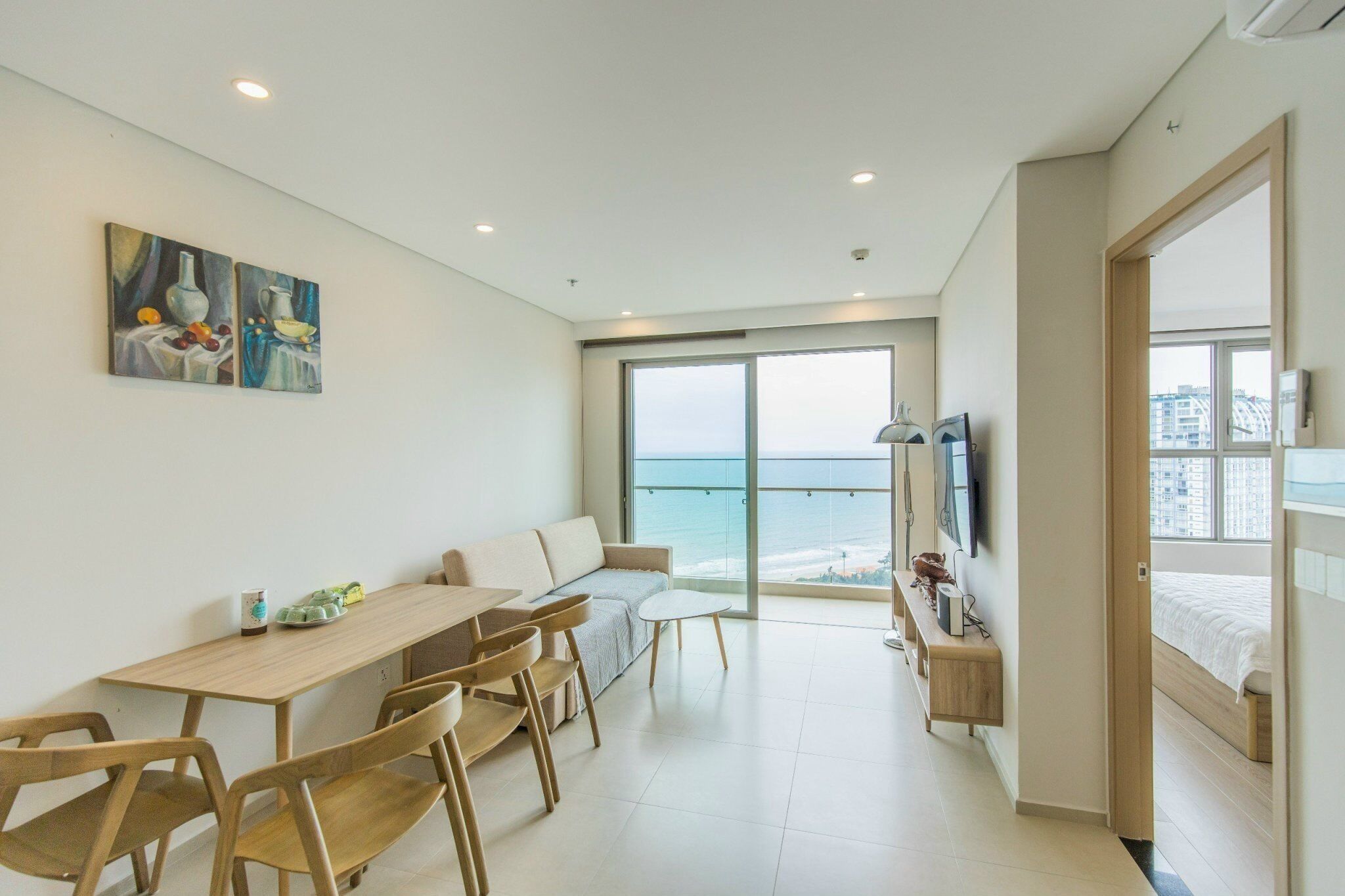 Familieleilighet | Oppholdsområde | Flatskjerm-TV og bøker