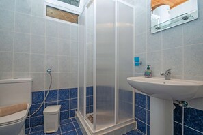 Hair dryer, towels, soap, shampoo