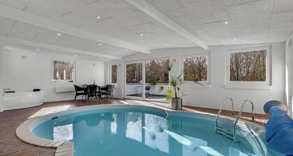 Holiday home with pool and spa close to the Limfjord.