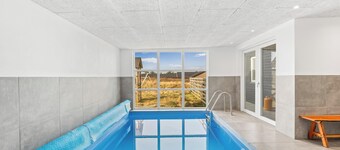 Pool house with activity room, built in 2020, with a view of the North Sea.