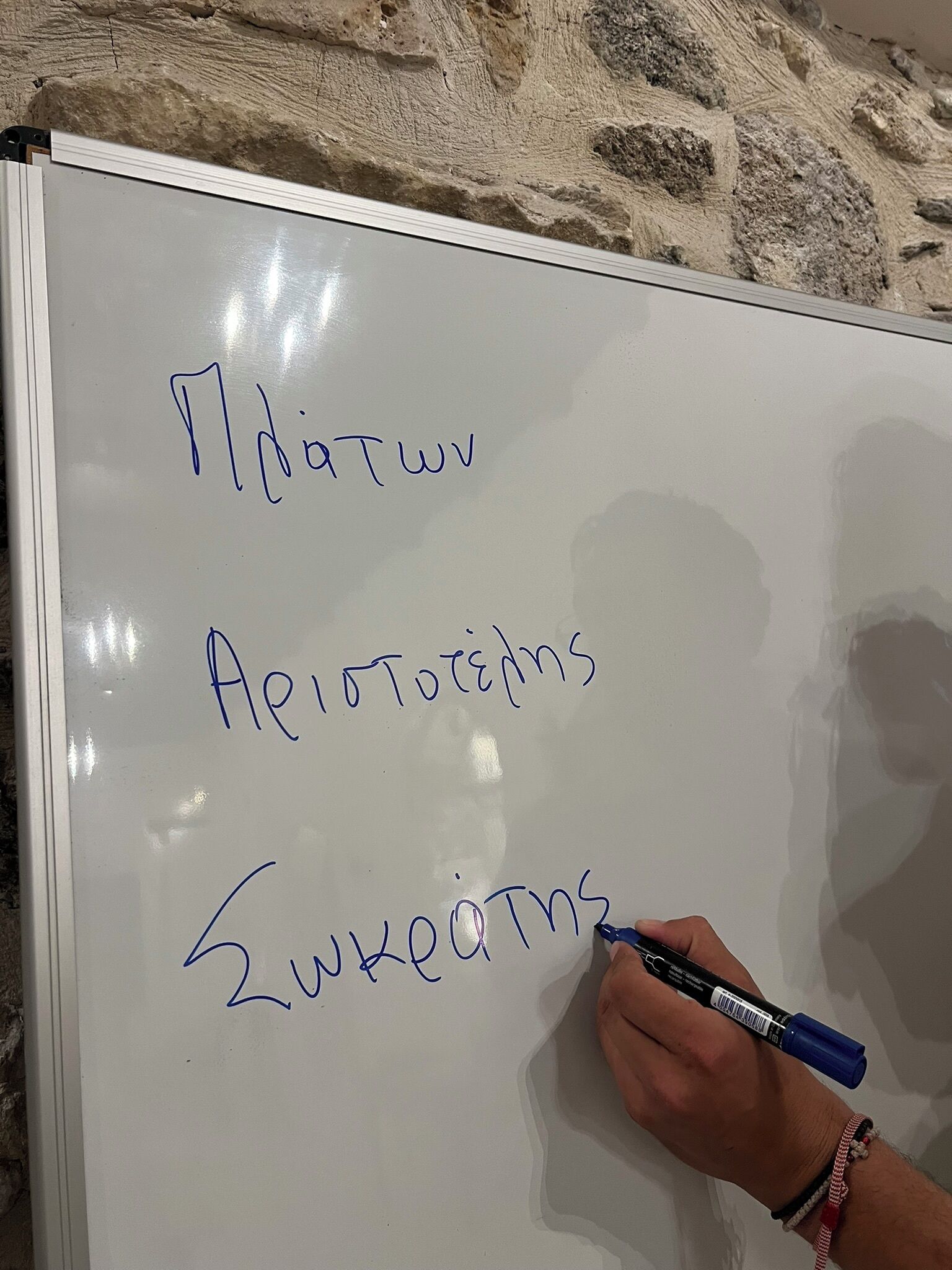 A whiteboard with handwritten text.