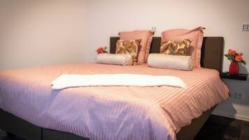 4 slaapkamers, een strijkplank/strijkijzer, wifi, beddengoed