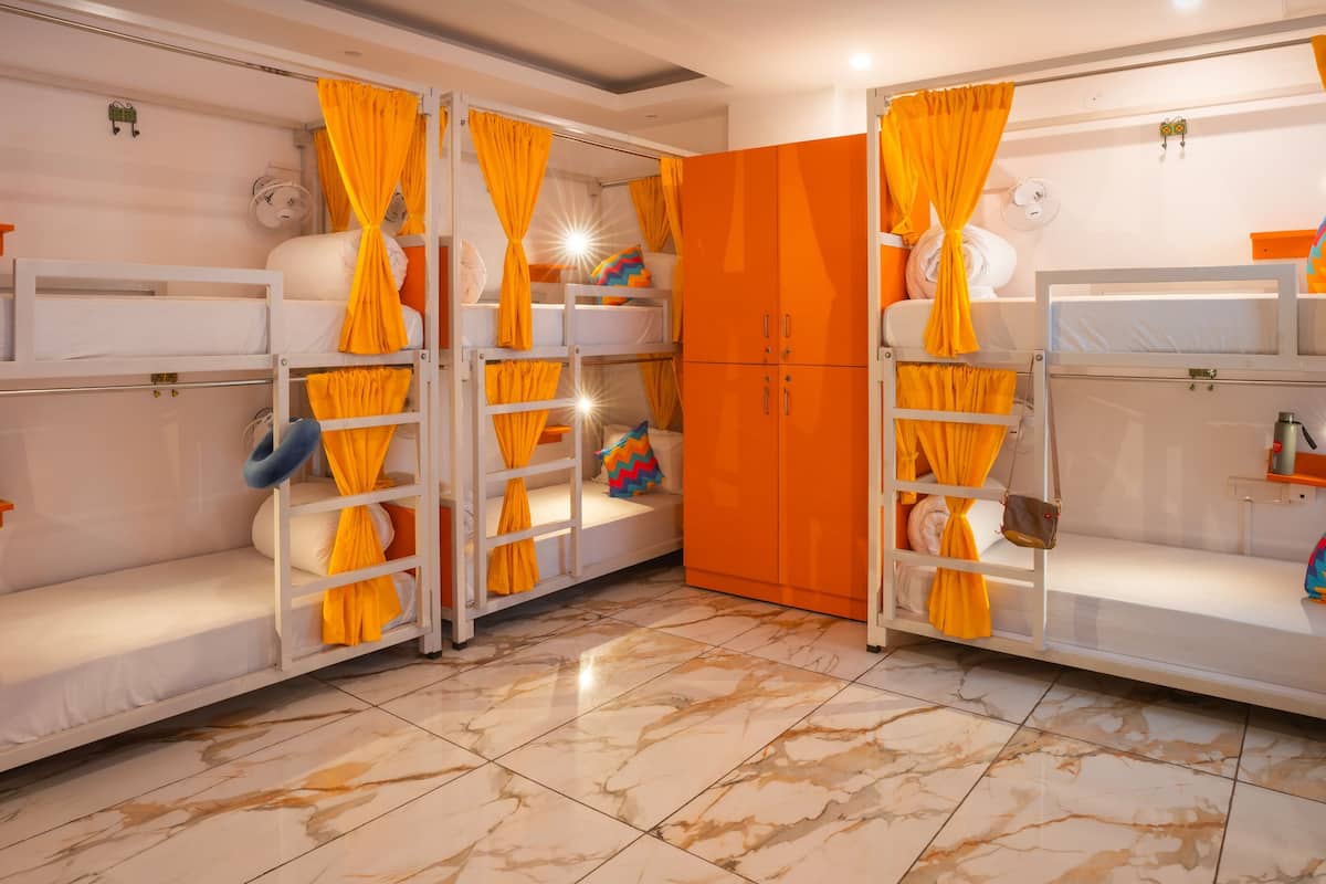 Bed in 10 Bed Mixed A/C Dormitory Room with Ensuite Bathroom | Free WiFi