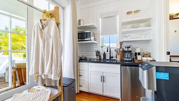 Microwave, coffee/tea maker, toaster, cookware/dishes/utensils