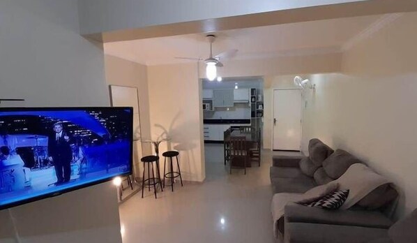 Standard Apartment | Living area | 32-inch Smart TV with digital channels