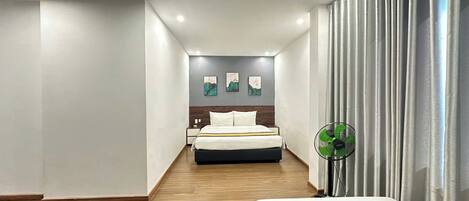 Luxury Triple Room, City View | Hypo-allergenic bedding, memory foam beds, minibar, free WiFi