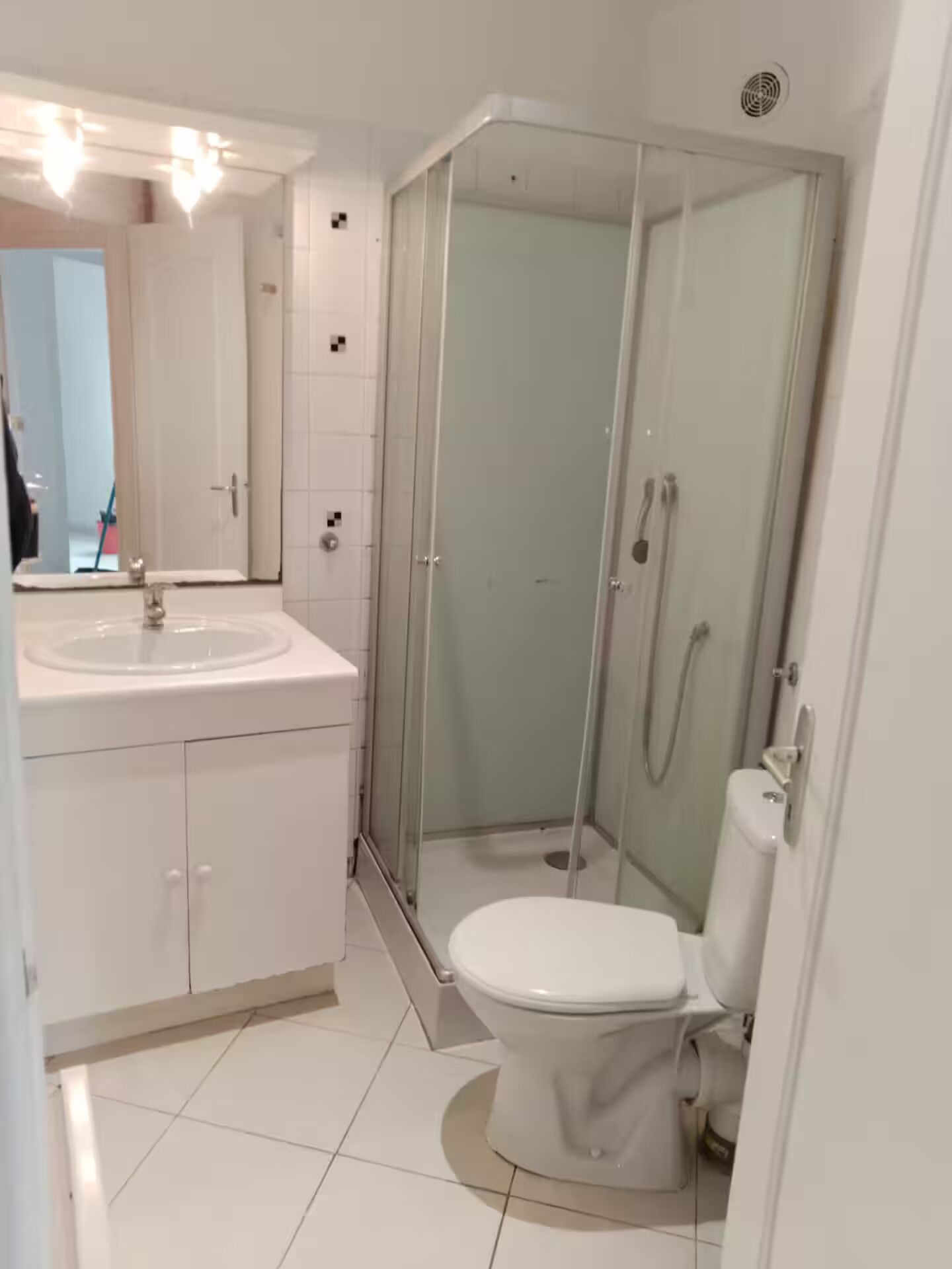 Shower, towels, soap, toilet paper