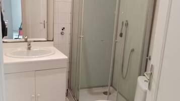 Shower, towels, soap, toilet paper