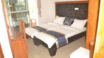 Standard Twin Room, Courtyard View | 1 bedroom, laptop workspace, free WiFi