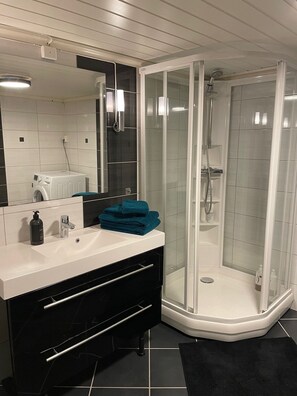 Hair dryer, towels, soap, shampoo