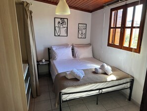 1 habitación, tabla de planchar con plancha, wifi y ropa de cama 