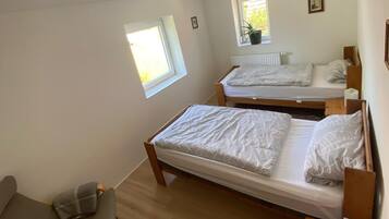 3 bedrooms, desk, iron/ironing board, travel crib