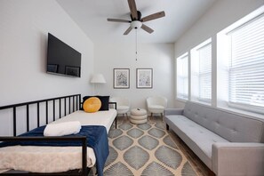 4 bedrooms, desk, iron/ironing board, travel crib