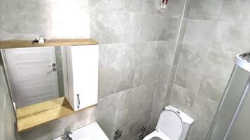 Shower, towels, soap, shampoo