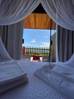 Chambre, balcon, vue lagon | Minibar, Wi-Fi gratuit