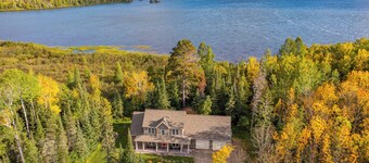 Superb 4-bedroom house on Shagawa Lake with dock, boat lift, and total comfort.