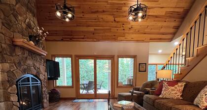 Superb 4-bedroom house on Shagawa Lake with dock, boat lift, and total comfort.