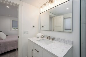 Shower, eco-friendly toiletries, hair dryer, towels - Modern Hilton Head Oasis ~ Pool, Fire Pit, Dog Friendly, Steps to Beach! (Hilton Head Island)
