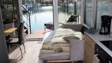 Apartment (Two Bedroom Floating House) | Living room | 32-inch flat-screen TV with satellite channels, stereo