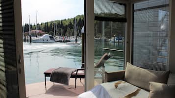 Apartment (Two Bedroom Floating House) | Living room | 32-inch flat-screen TV with satellite channels, stereo