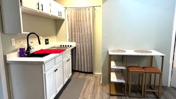 Microwave, stovetop, coffee/tea maker, toaster