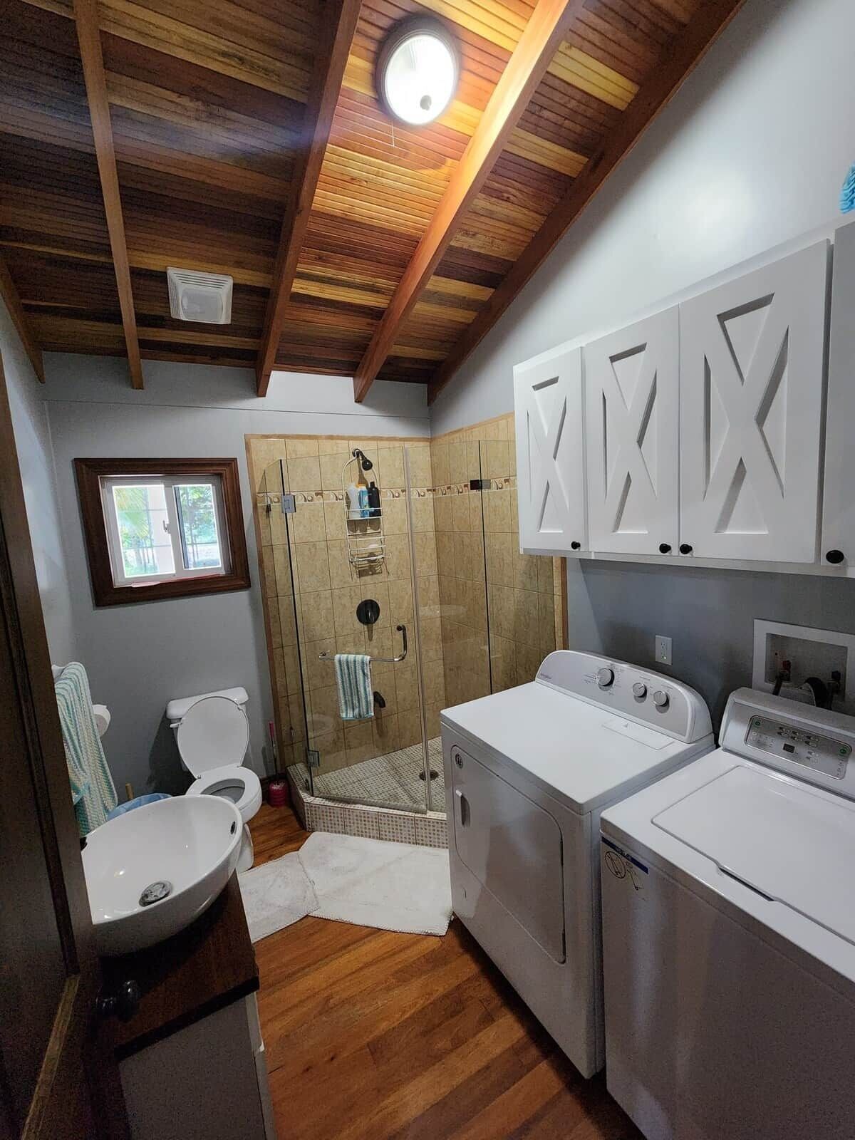 Shower, towels, soap, toilet paper