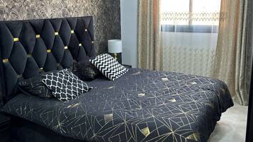 2 dormitorios, tabla de planchar con plancha, wifi y ropa de cama