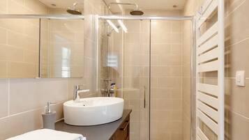 Hair dryer, towels, soap, shampoo
