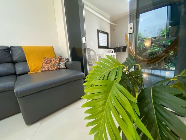 Standard Apartment | Living area | 32-inch TV with digital channels