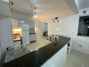 Standard Apartment | Private kitchen | Fridge, microwave, oven, toaster