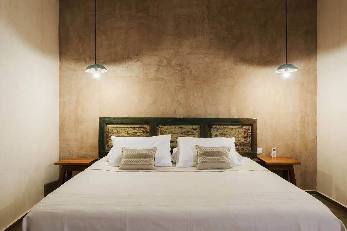 Deluxe Room, Patio, Courtyard View | Egyptian cotton sheets, premium bedding, down duvets, iron/ironing board